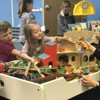 cooperative play with dinosaurs and the farm
